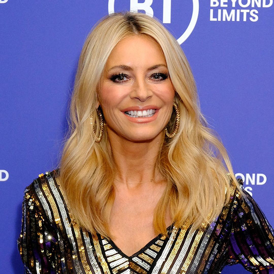 Tess Daly steals the show in striking golden top on night out