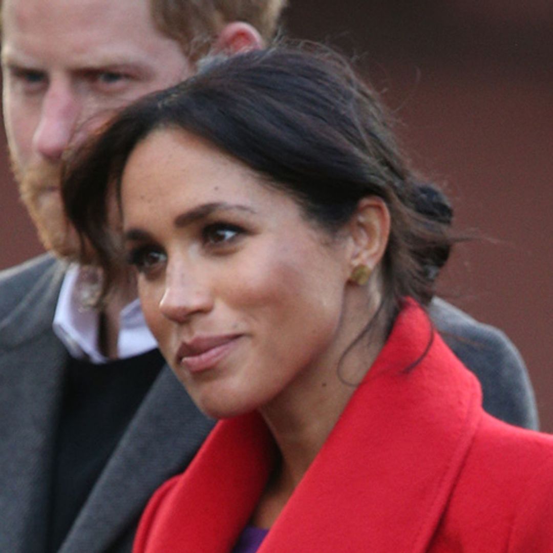 Meghan Markle wears the MOST regal colours on visit to Merseyside with Prince Harry