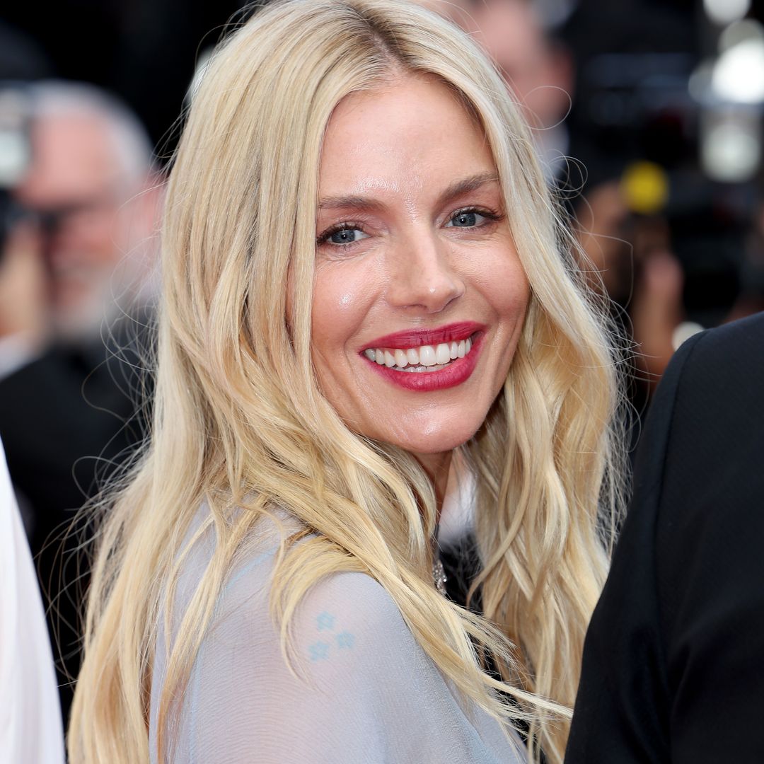 Pregnant Sienna Miller shows off blossoming bump in unexpected dress