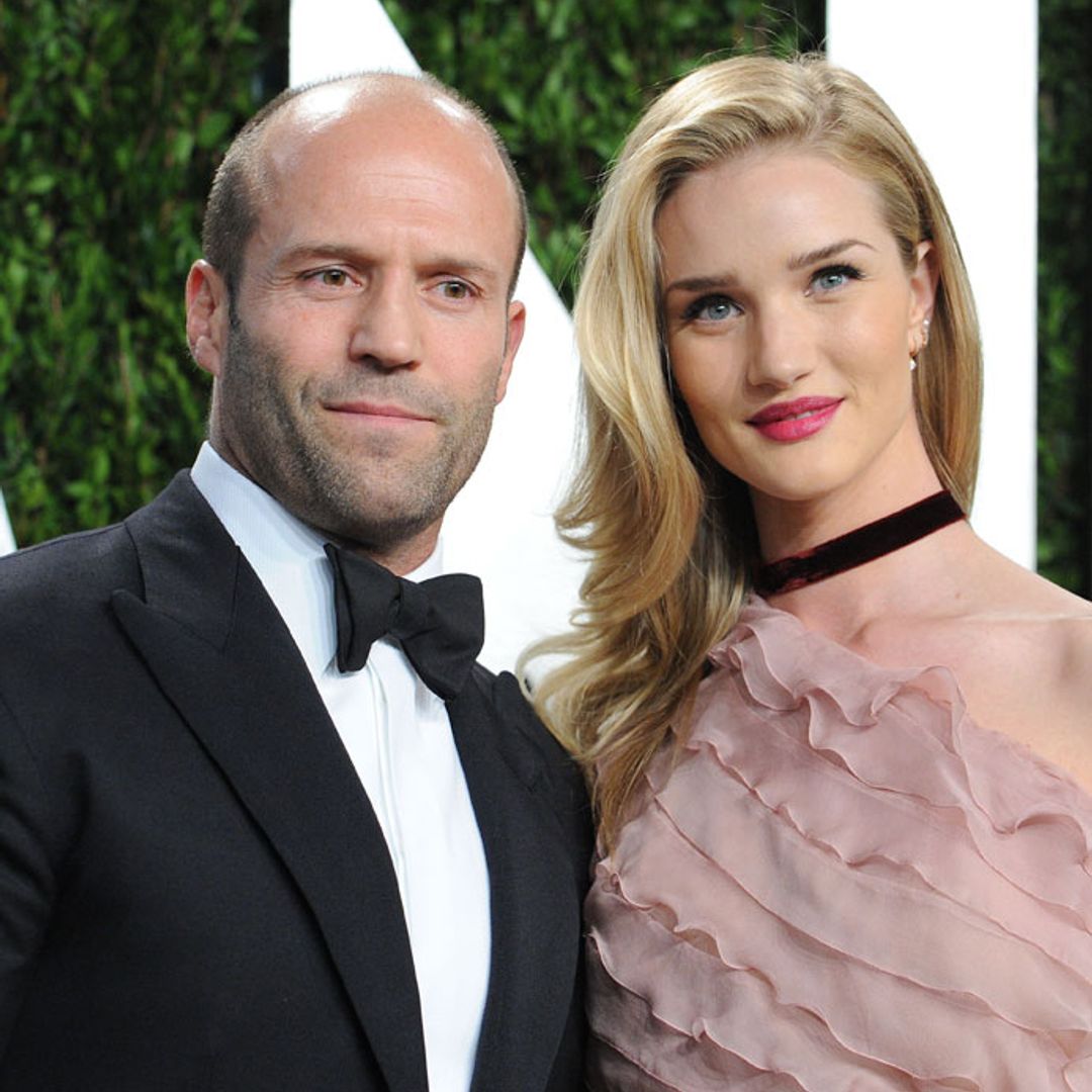 Rosie Huntington-Whiteley steals the show in a sexy short dress as she supports boyfriend Jason Statham