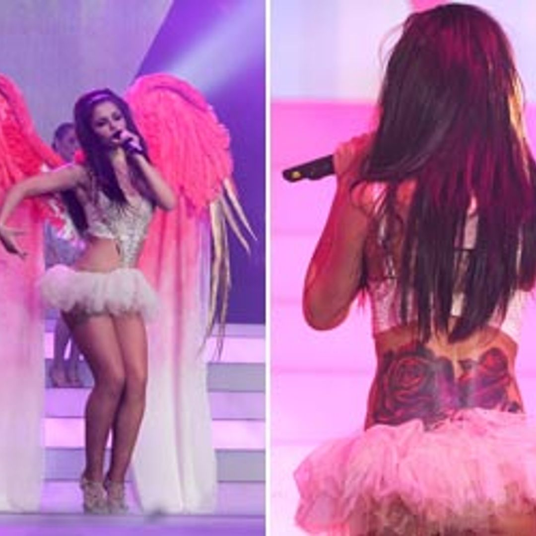 Cheryl Cole reveals new back tattoo on Girls Aloud tour