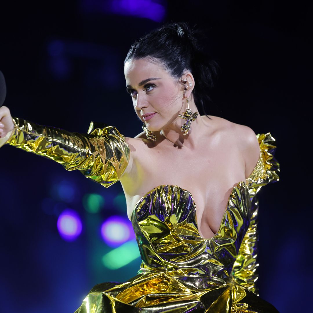 Katy Perry dazzles onstage in gold gown as she details her Windsor Castle sleepover