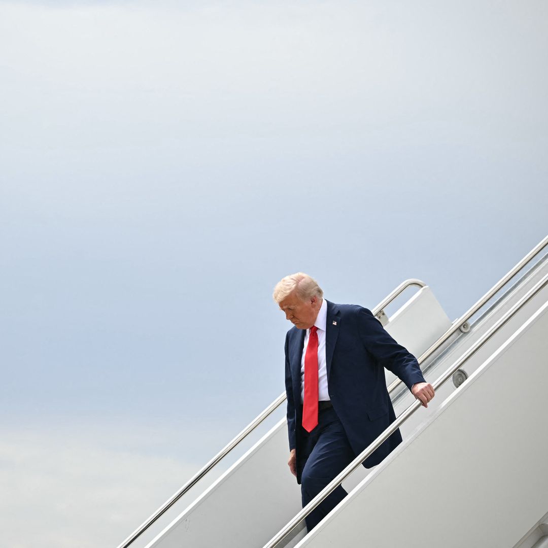 US President Donald Trump steps off Air Force One upon arrival at Luke Air Force Base in Glendale, Arizona, on September 21, 2025 to attend the memorial for right-wing activist Charlie Kirk.