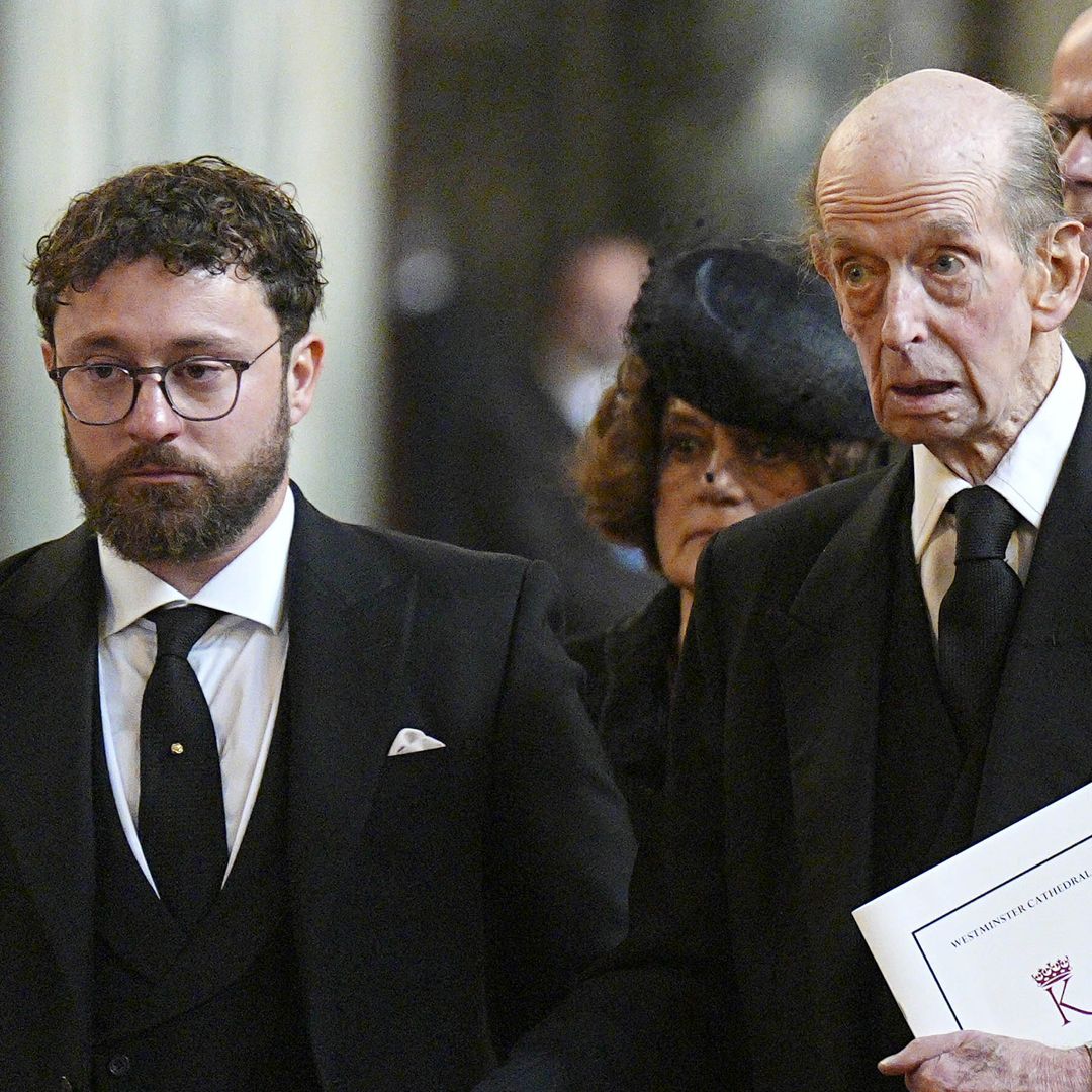 Duke of Kent supported by grandson Lord Downpatrick in dutiful moment after Duchess of Kent's funeral