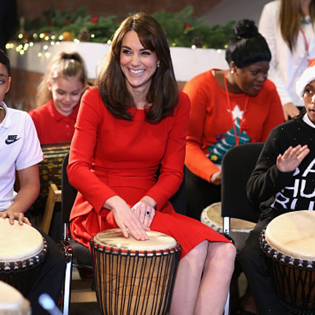 Kate Middleton plays drums at children's Christmas party at Anna Freud Centre