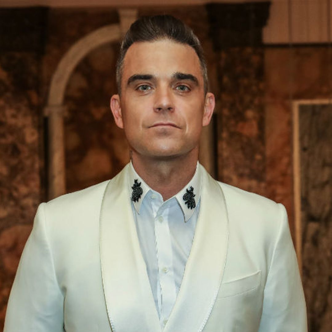 Robbie Williams rushed to safety after being caught up in London hotel fire