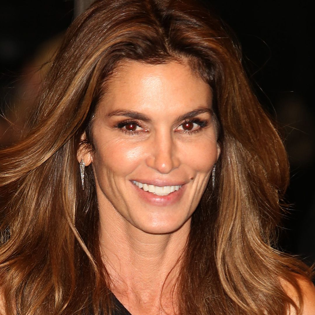 Cindy Crawford wows in slinky top and leather trousers for festive date night