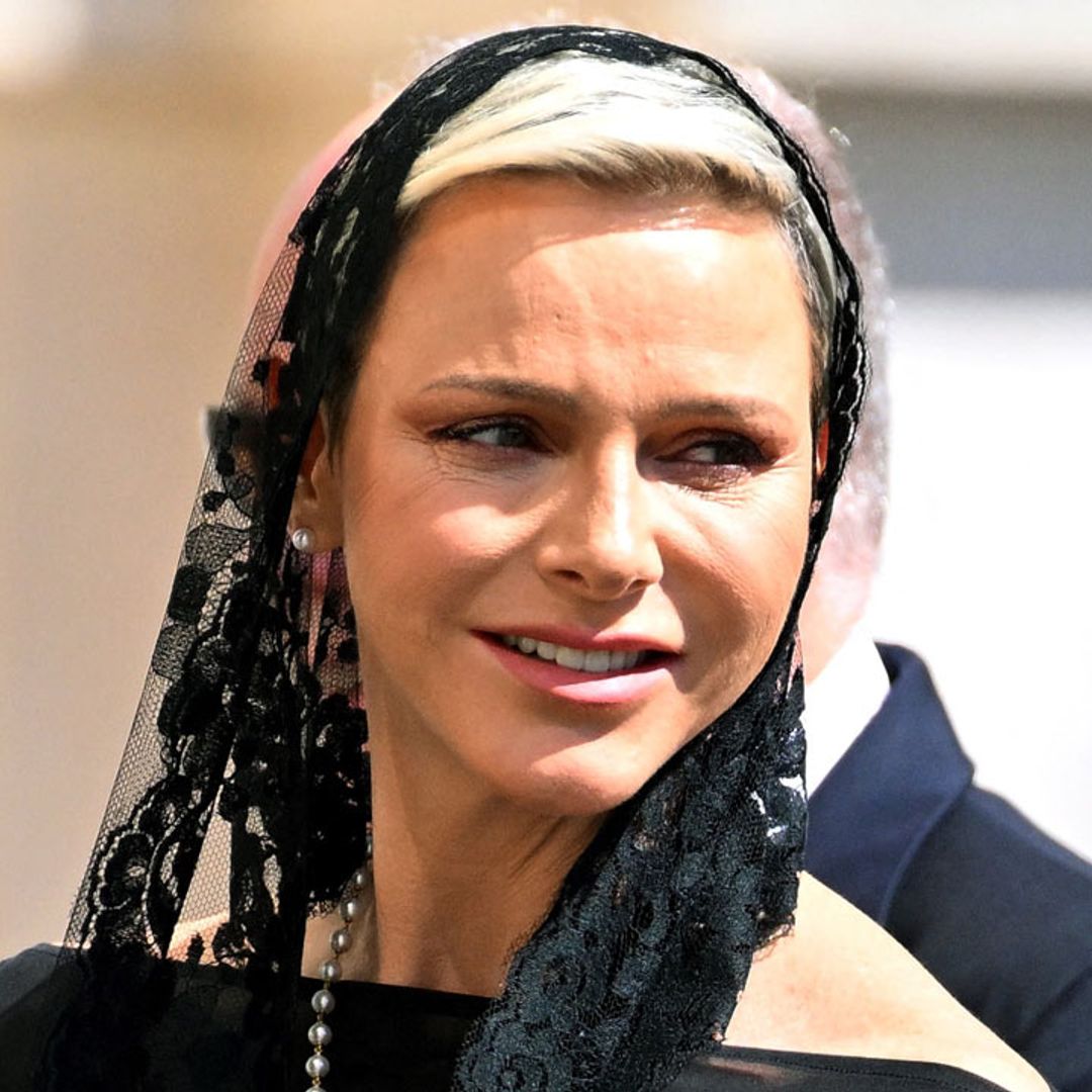 Why didn't Princess Charlene wear white to meet the Pope?