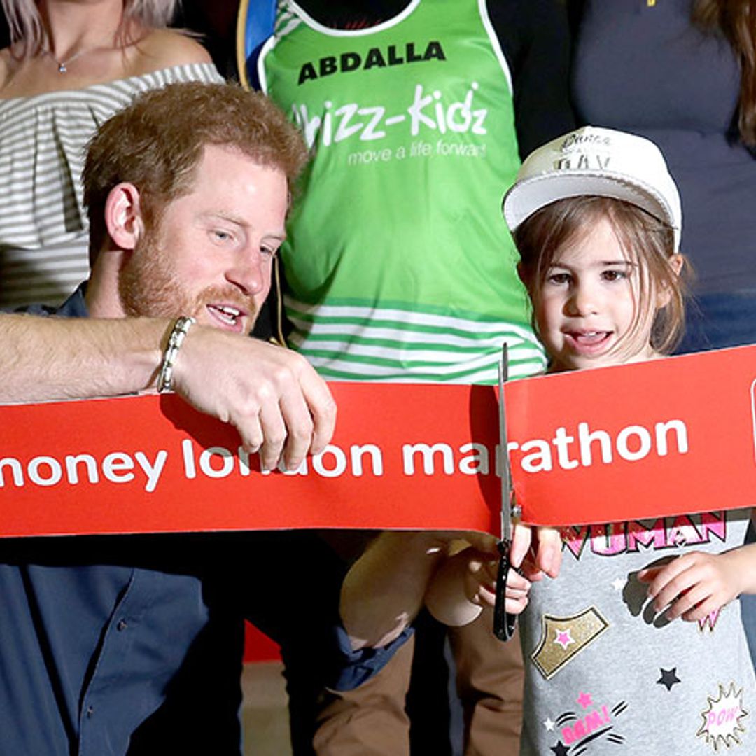 Prince Harry gets a little help from young friend as he opens London Marathon