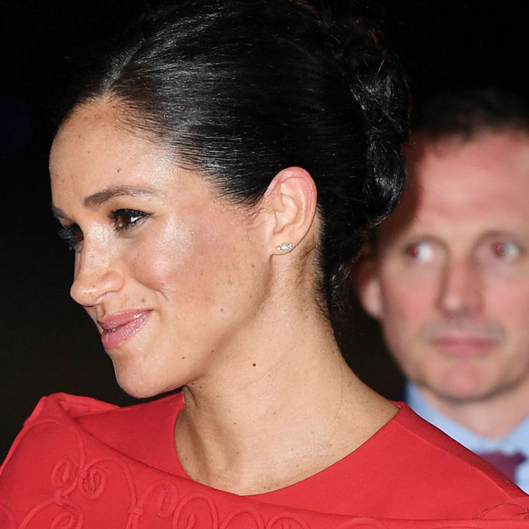 Meghan Markle wraps bump in red Valentino for Morocco babymoon