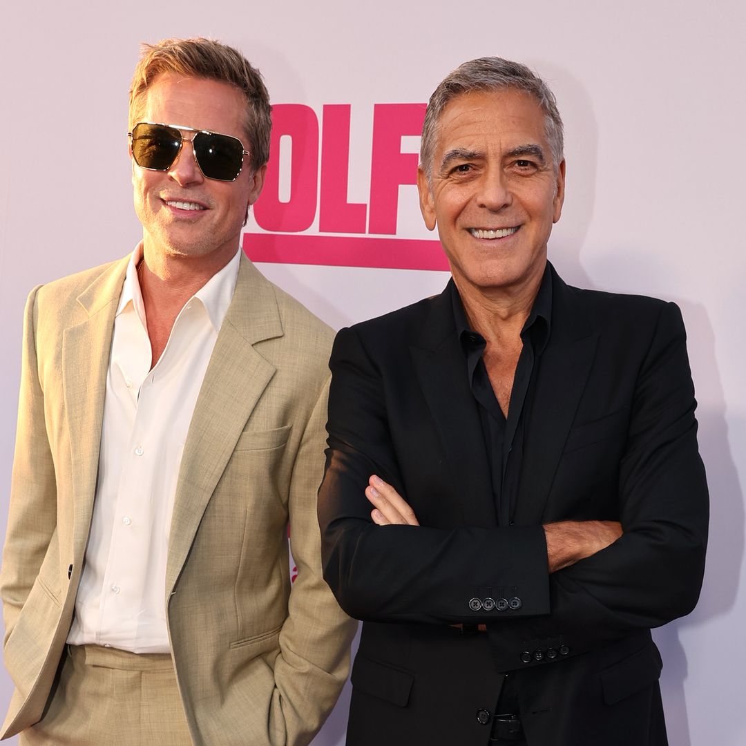 Brad Pitt, 60, and George Clooney, 63, look eternally youthful during joint red carpet appearance