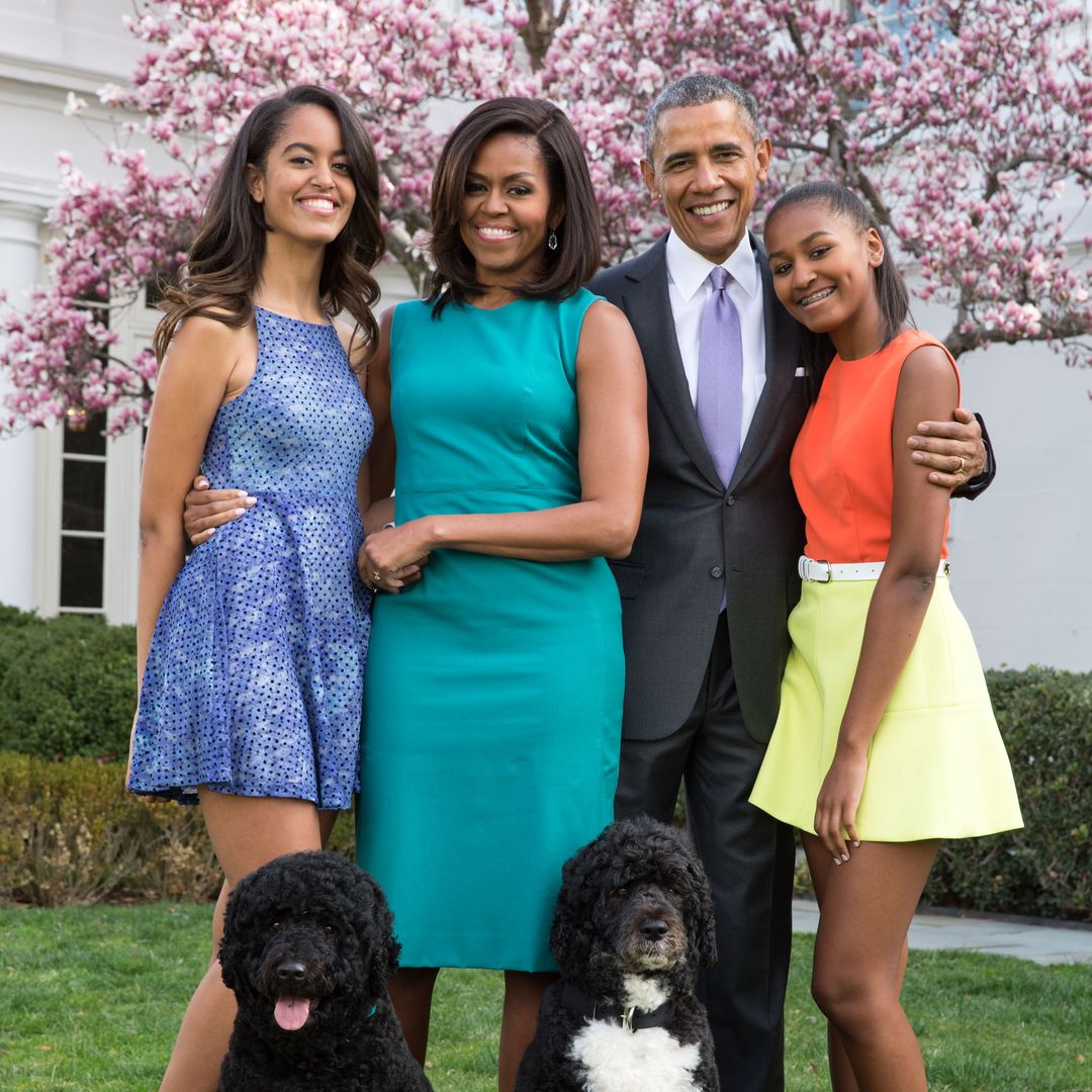Michelle and Barack Obama's daughters Malia and Sasha make rare appearance in family Christmas portrait – see here