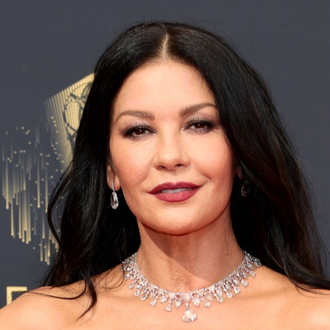 Catherine Zeta-Jones is haunting as she dons a slinky black gown in new photo
