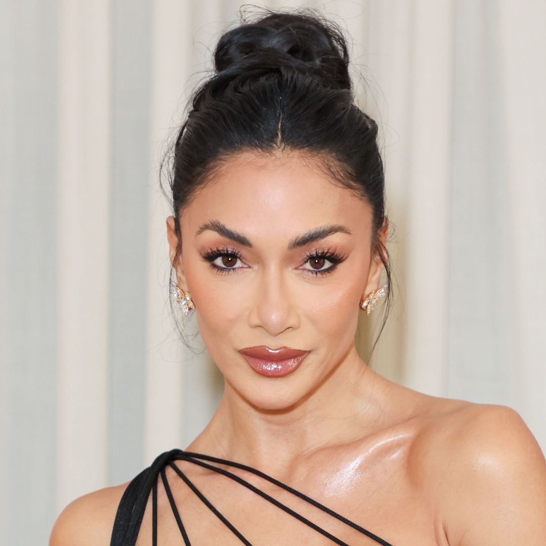 Nicole Scherzinger causes a stir in plunge leopard print bikini