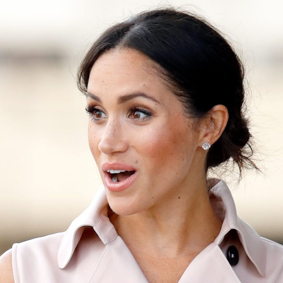 Duchess Meghan is caught gasping in surprise after a particularly big royal baby kick! See the sweet video
