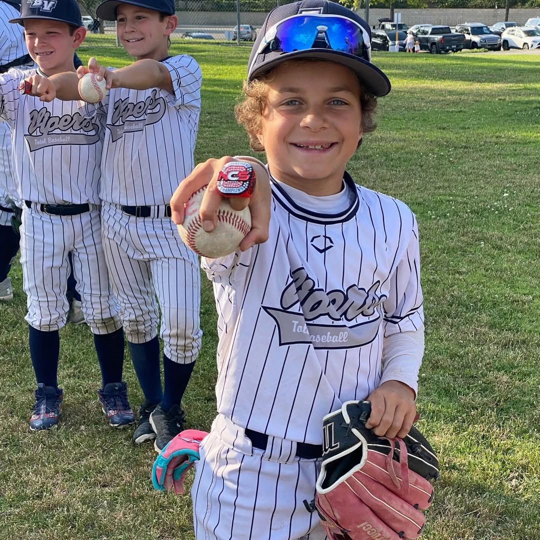 Alfonson Ribeiro's son Anders poses for a photo in his baseball uniform showing off his championship ring, shared on Instagram