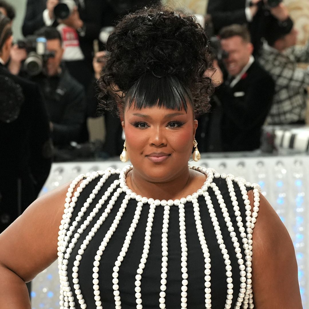 Lizzo looks unreal in double thigh-split dress – and she's got platinum blonde hair