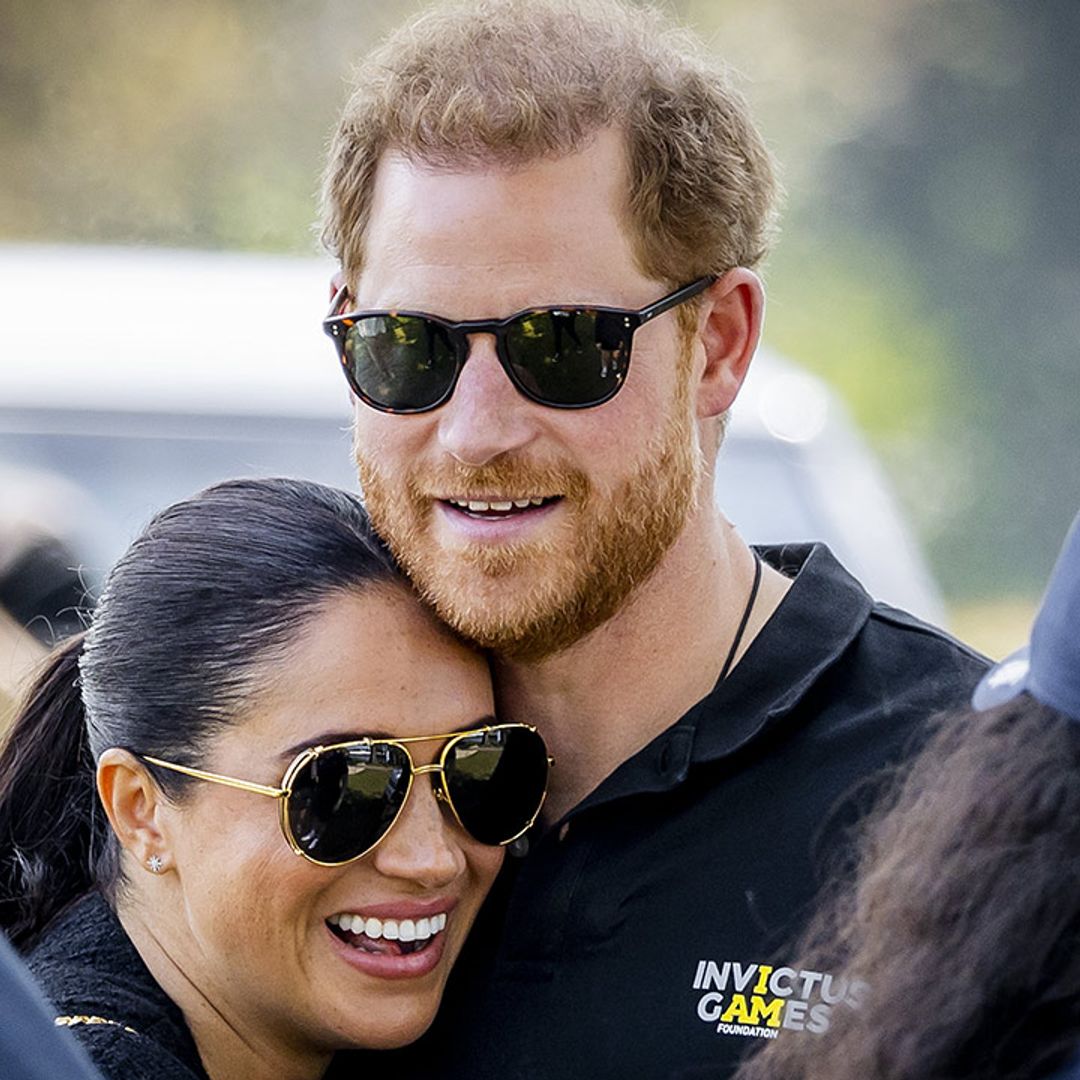 Prince Harry and Meghan Markle  have first public hug during Invictus Games - best photos