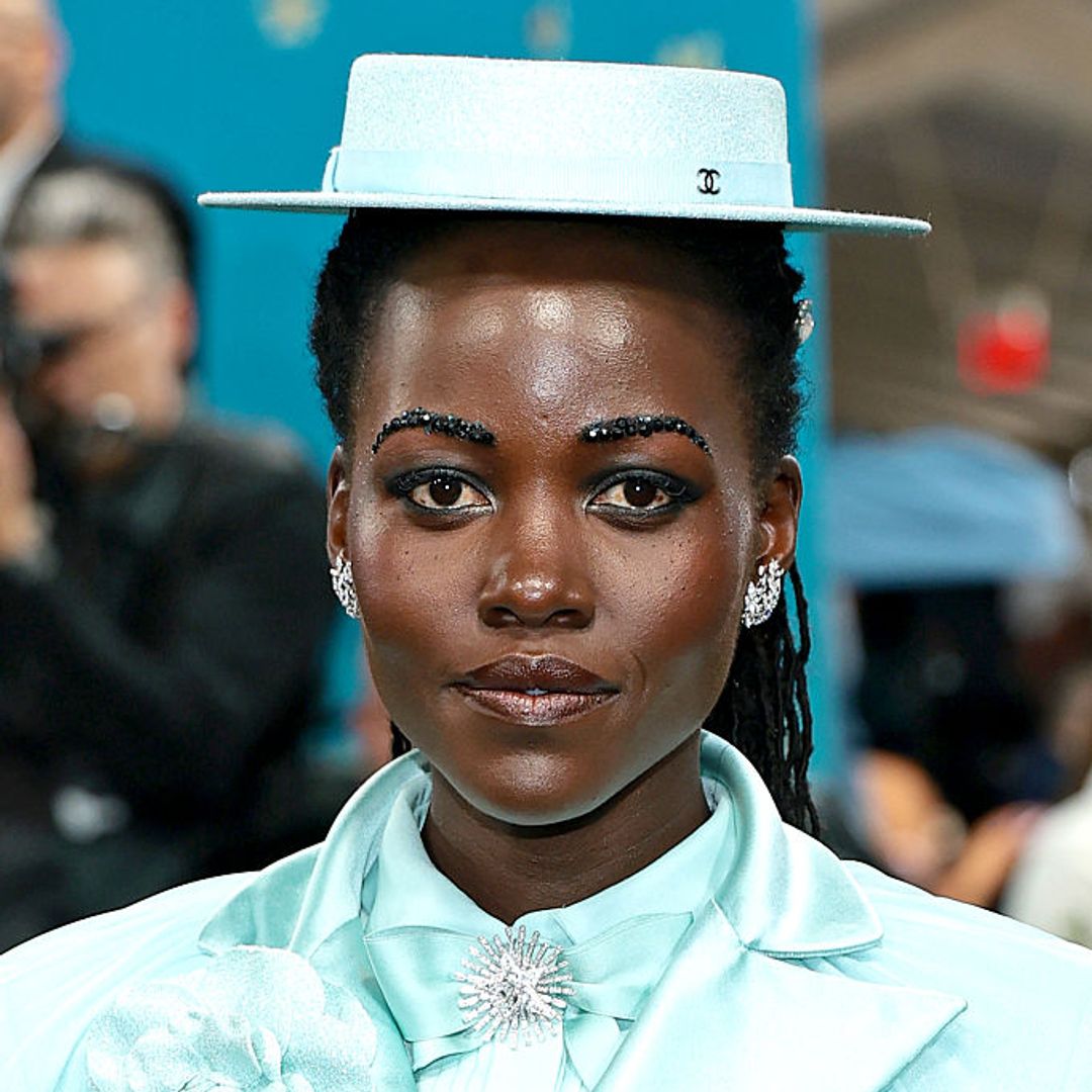 Lupita Nyong'o baby blue suit and hat
