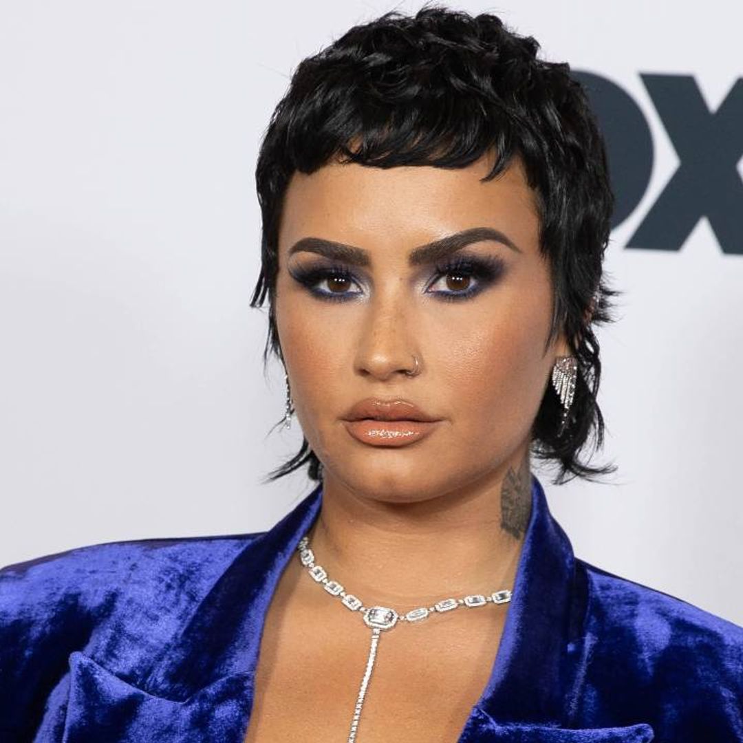 Demi Lovato’s pop-top earrings are everything we want in a summer accessory