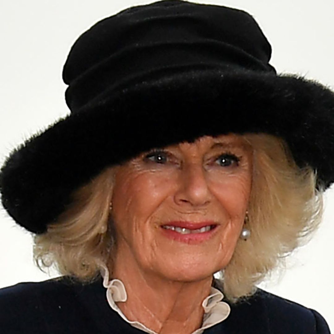 Duchess Camilla brings the glamour in faux fur hat and the Queen's accessories