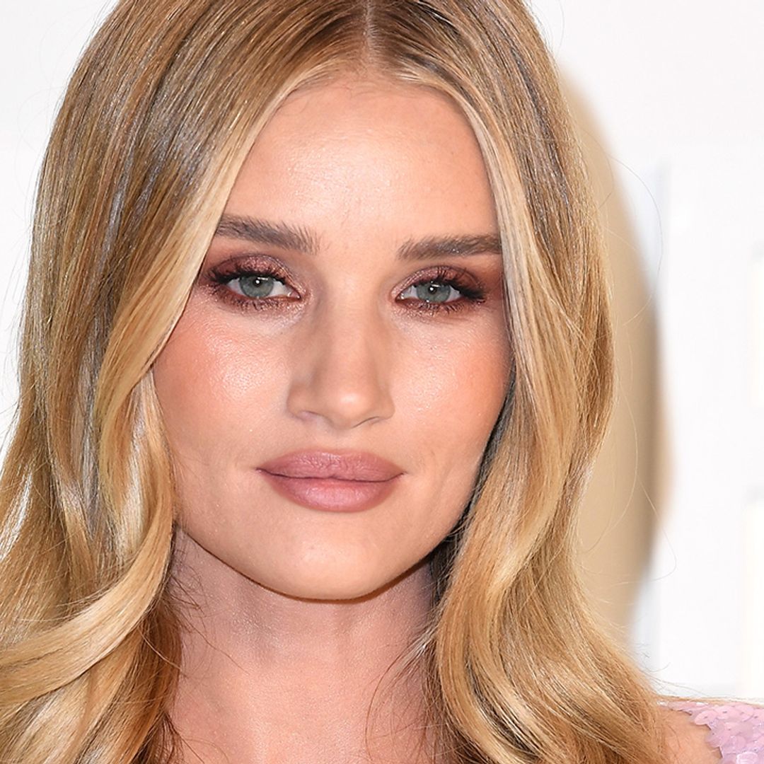 Rosie Huntington-Whiteley wows in red bikini in rare photo with baby daughter