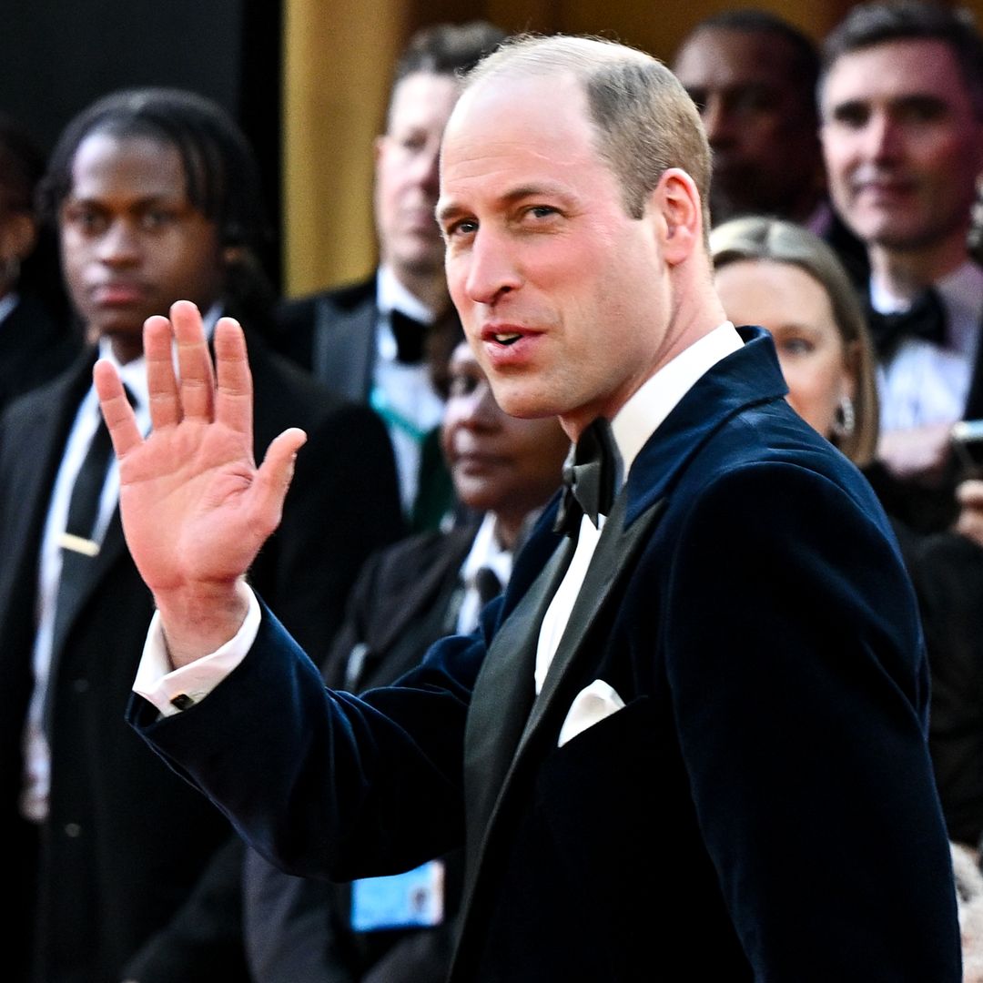 Prince William looks dapper as he arrives at BAFTAs while Princess Kate stays at home