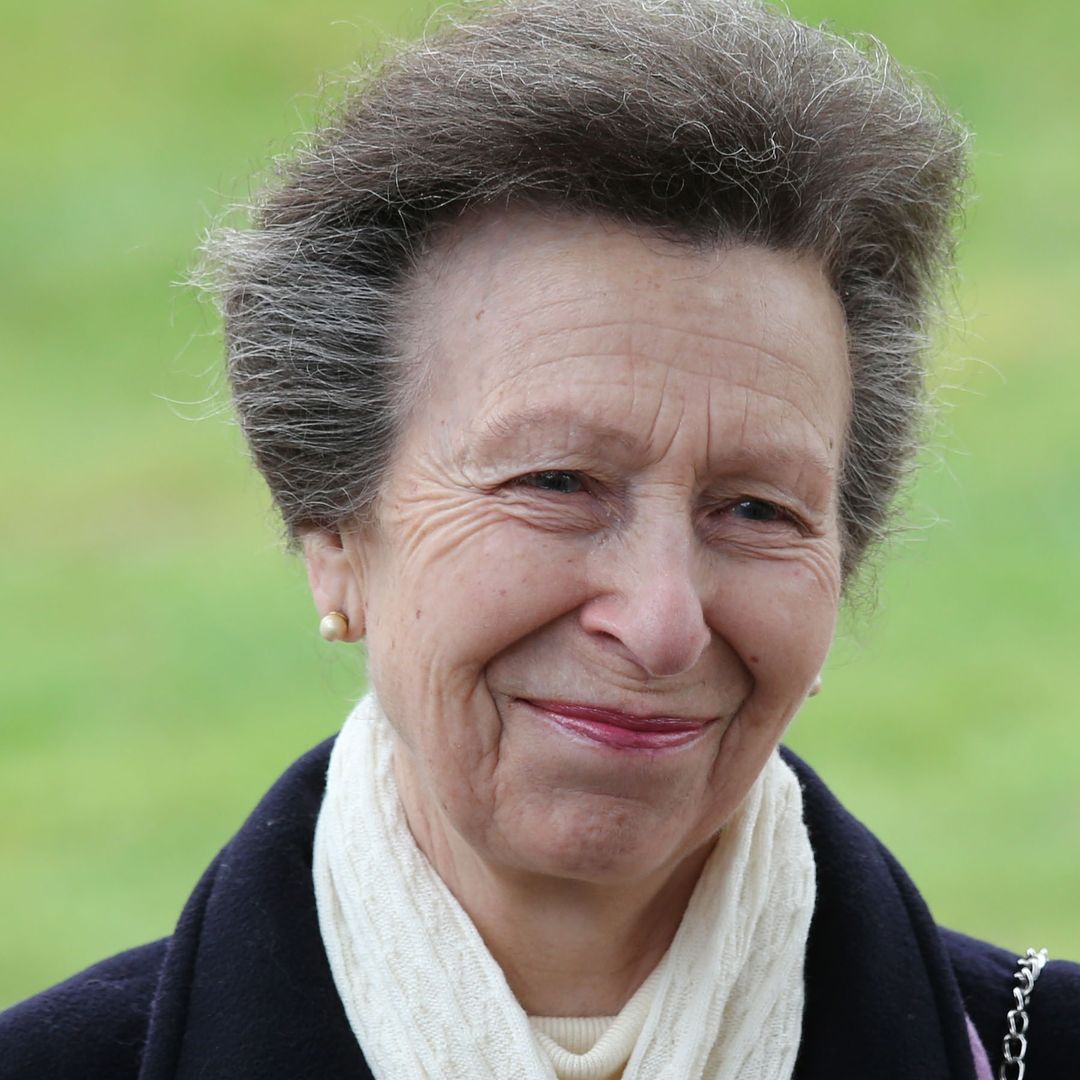 Princess Anne visits King Charles' boarding school in tassel boots and colour she rarely wears