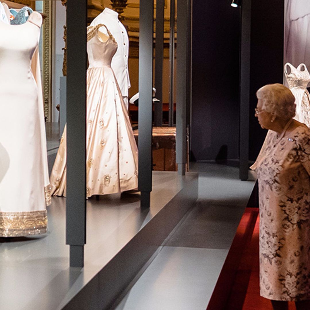 The Queen attends fashion exhibition showcasing 150 of her most iconic outfits