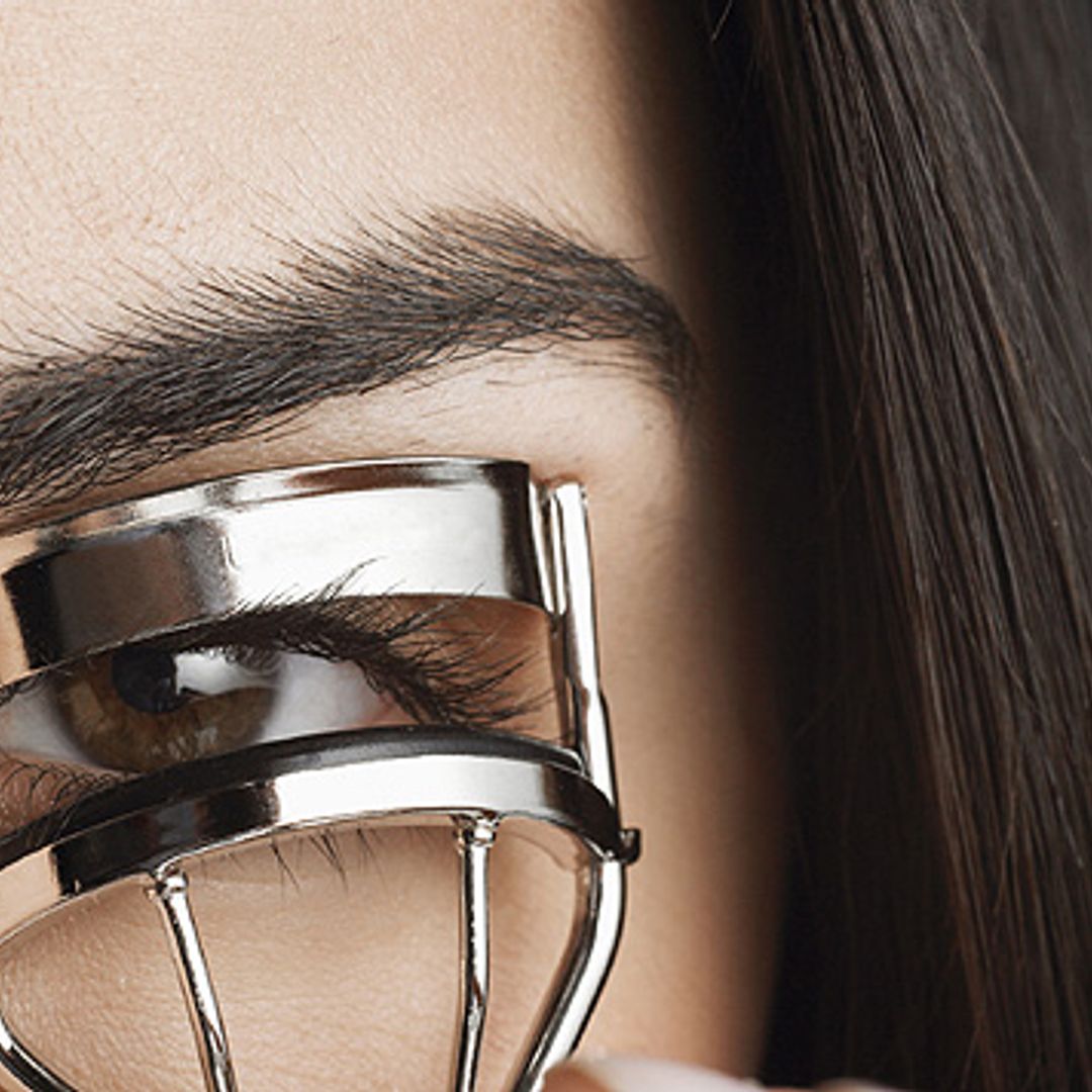 Curl your lashes for that wide-eyed look