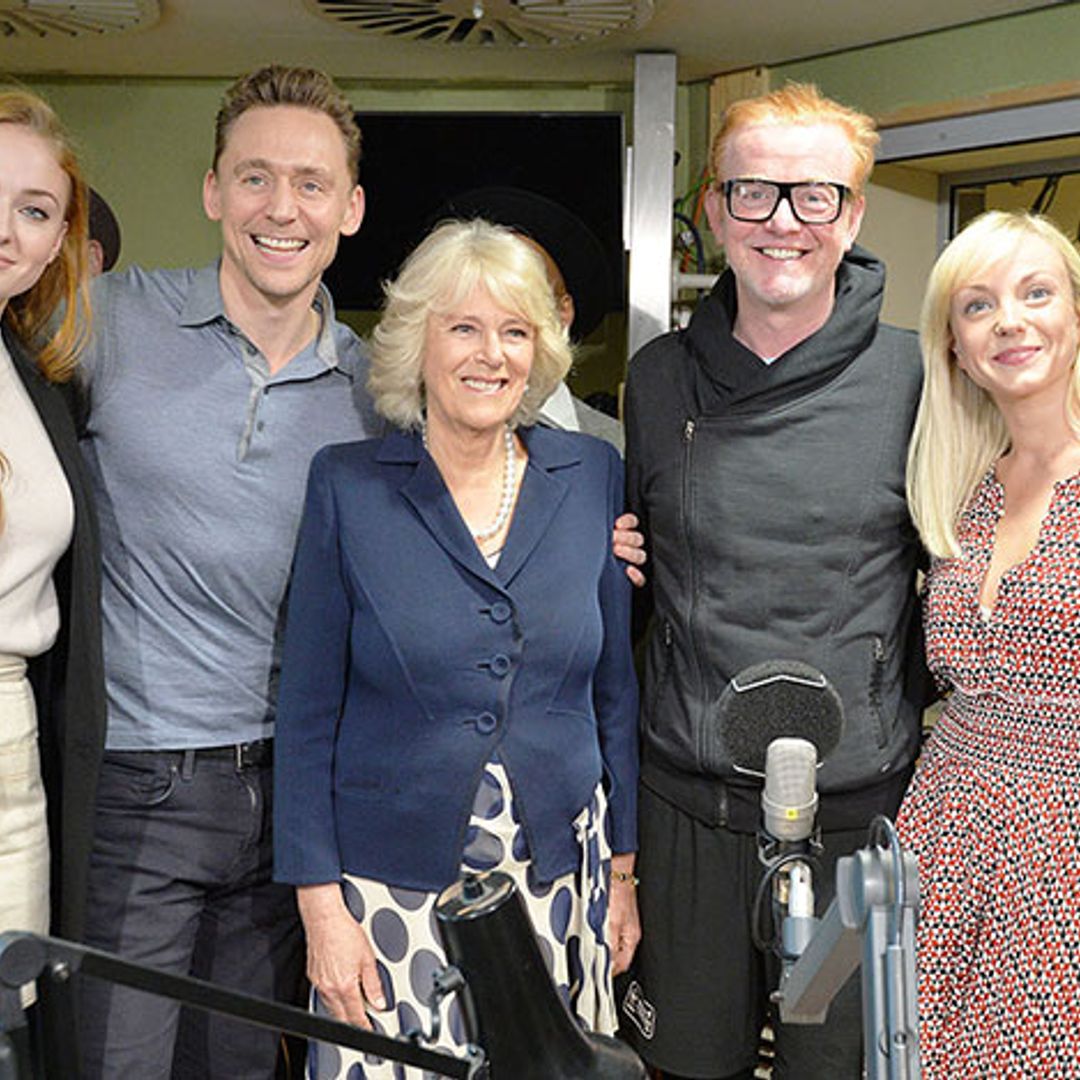 The Duchess of Cornwall jokes she's the 'envy of all the ladies' as she cosies up to Tom Hiddleston