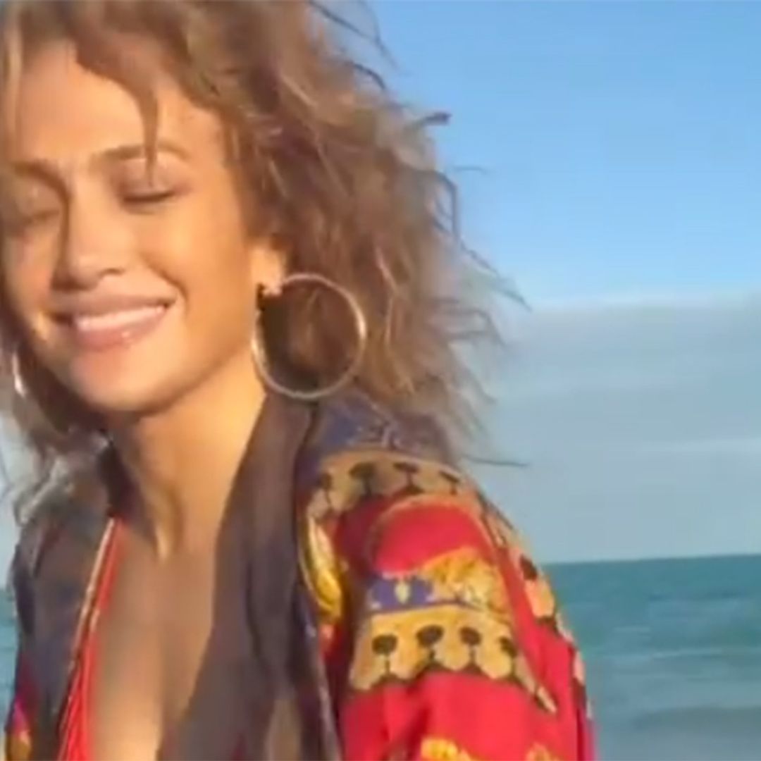 Jennifer Lopez WOWS in red bikini as she performs yoga on beach