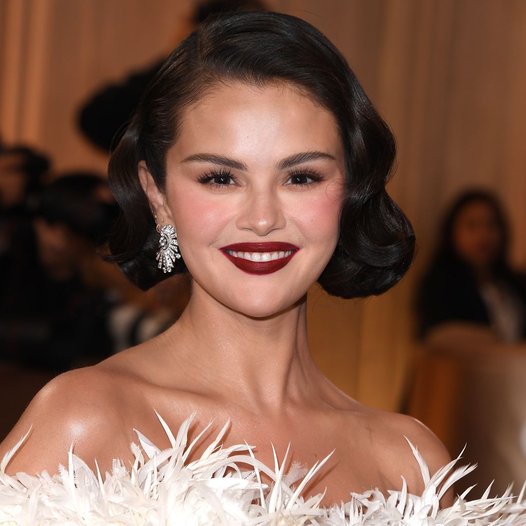 selena gomez with a bob and dark red lipstick 