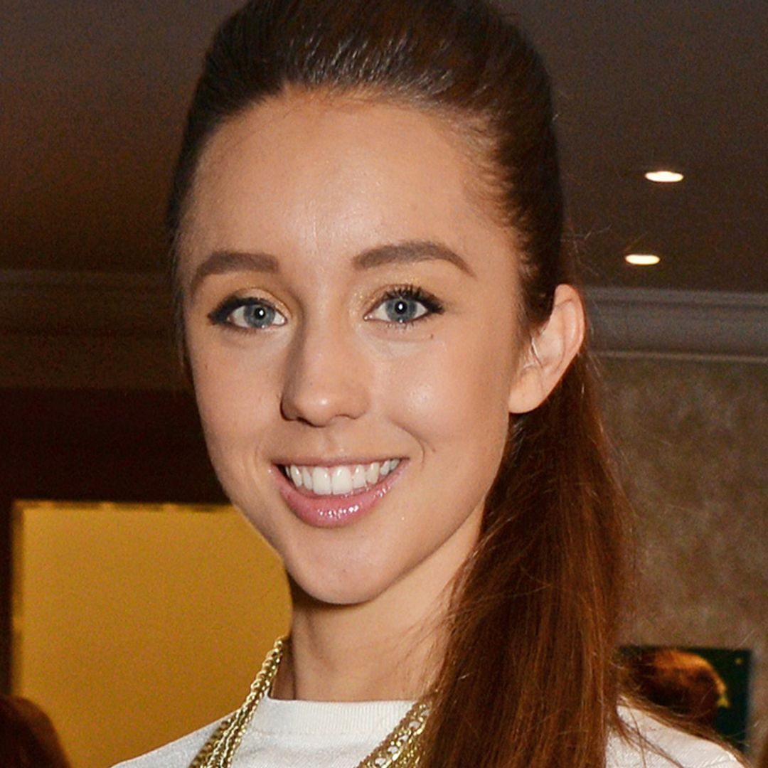 Emily Andre is the ultimate bombshell in unbelievable white dress