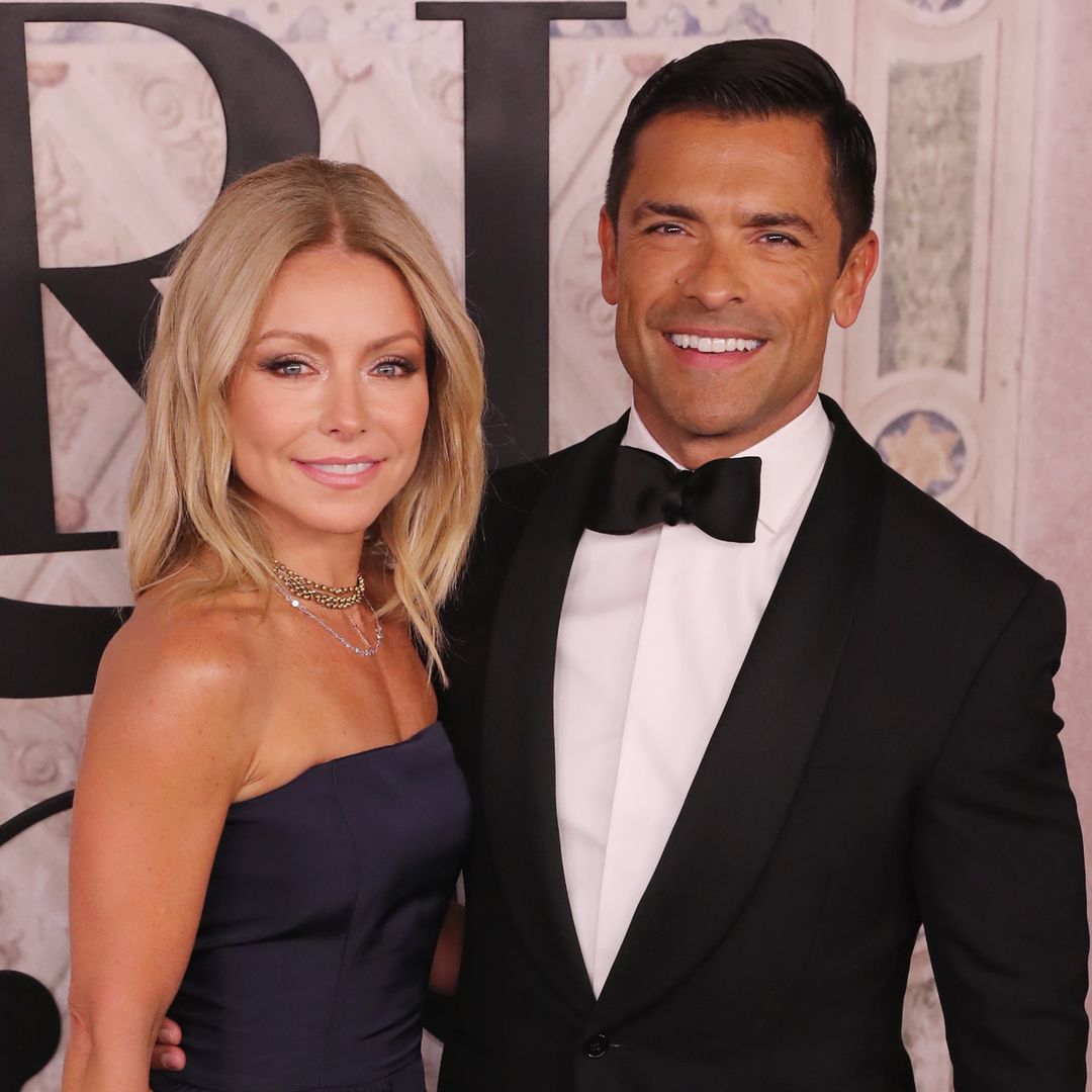 Kelly Ripa looks tiny in strapless swimsuit alongside ripped Mark Consuelos during vacation