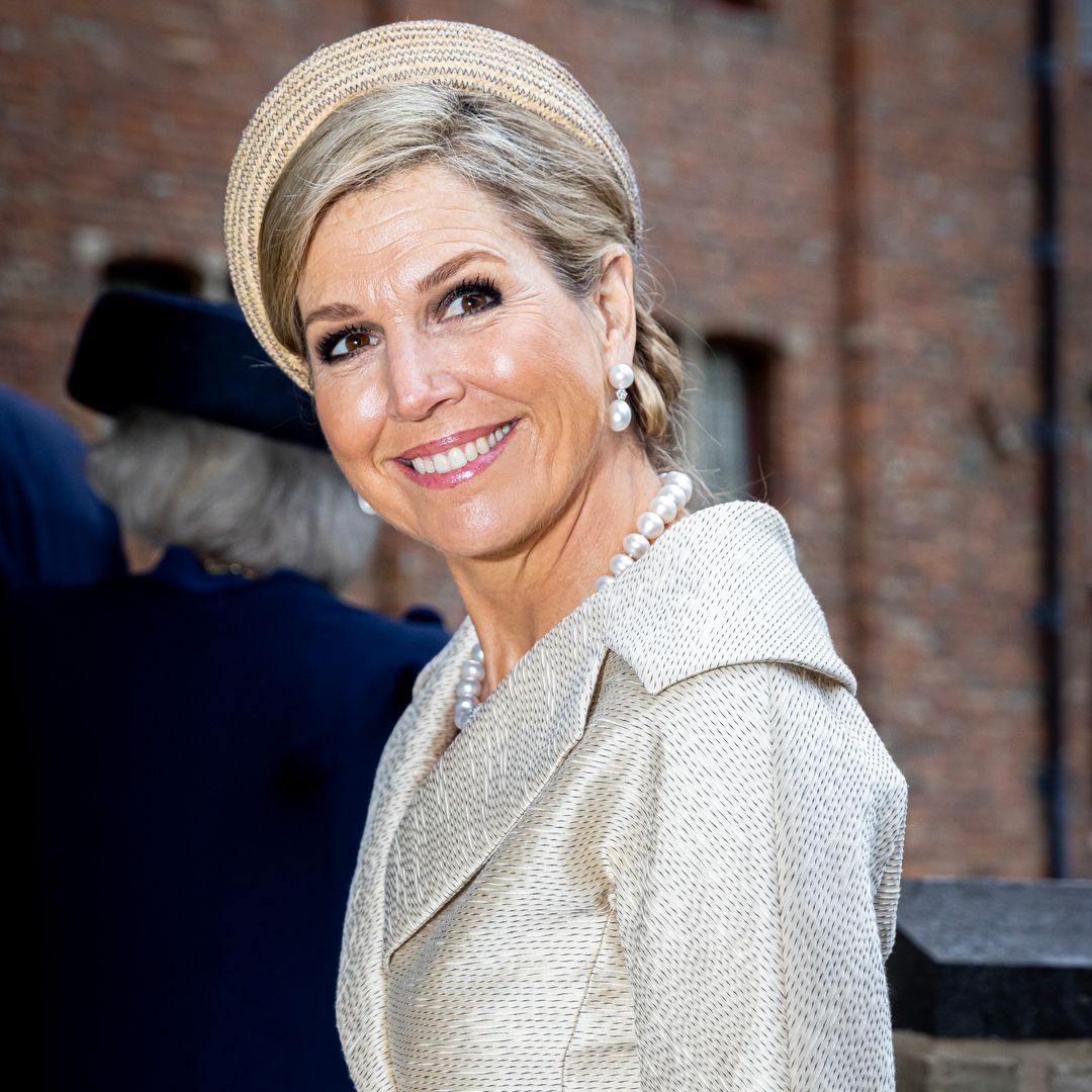Queen Máxima could be a 60s bride in Audrey Hepburn-worthy skirt and waist-cinching jacket