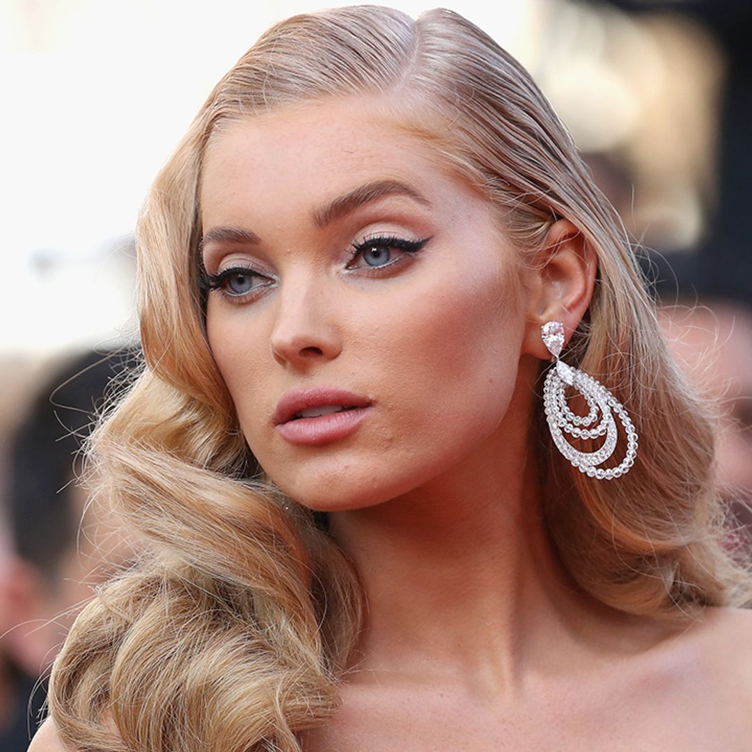Elsa Hosk is the ultimate It-girl in ab-baring bandeau and boyish suit