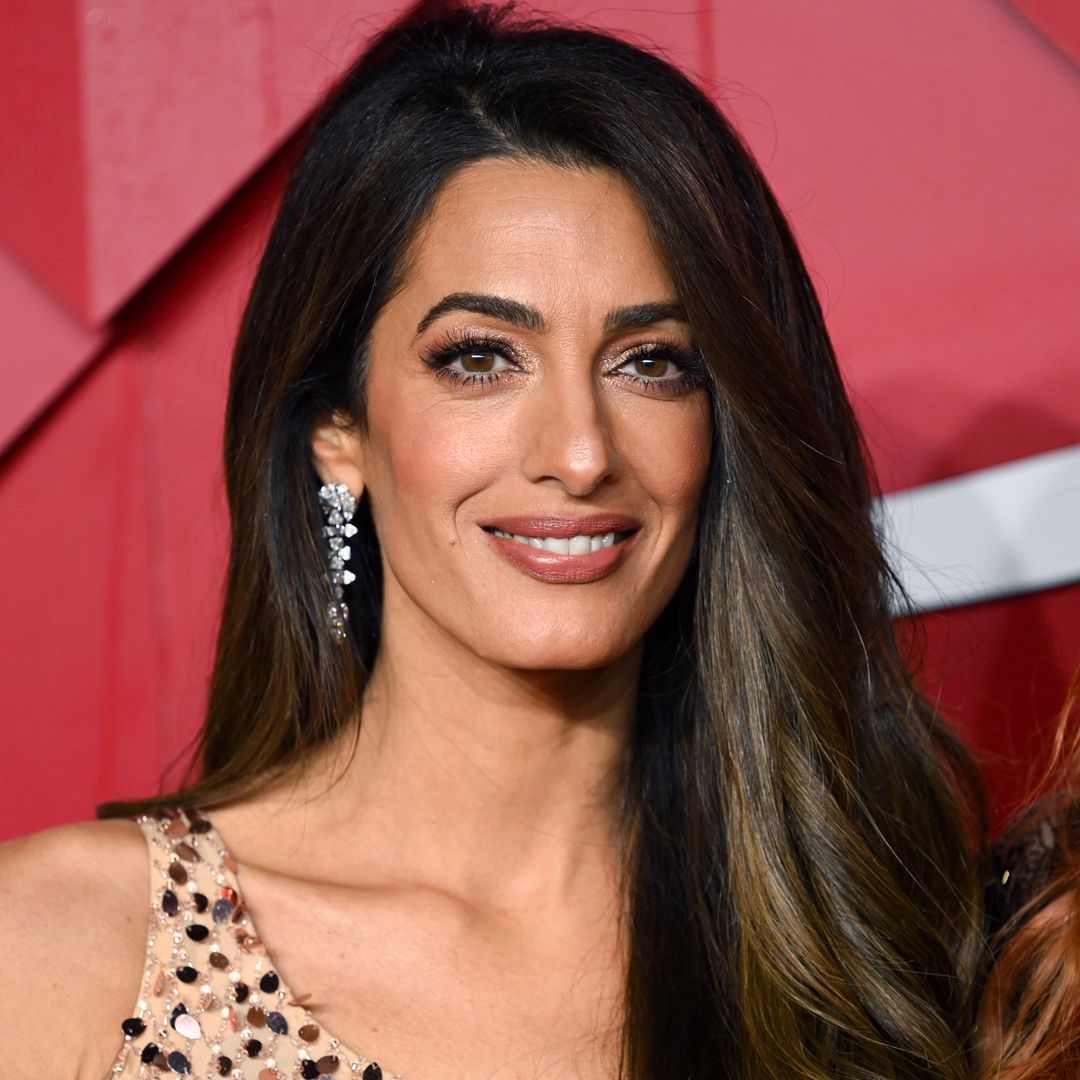 Amal Clooney is breathtaking in striking corseted gown for outing with husband George