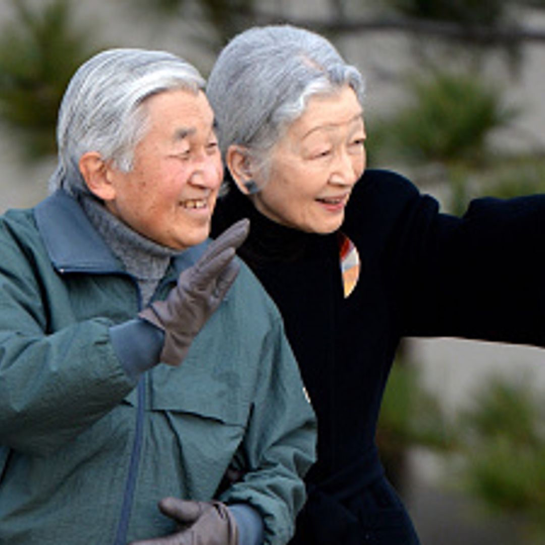 Japan's Emperor and Empress share sweet walk outdoors