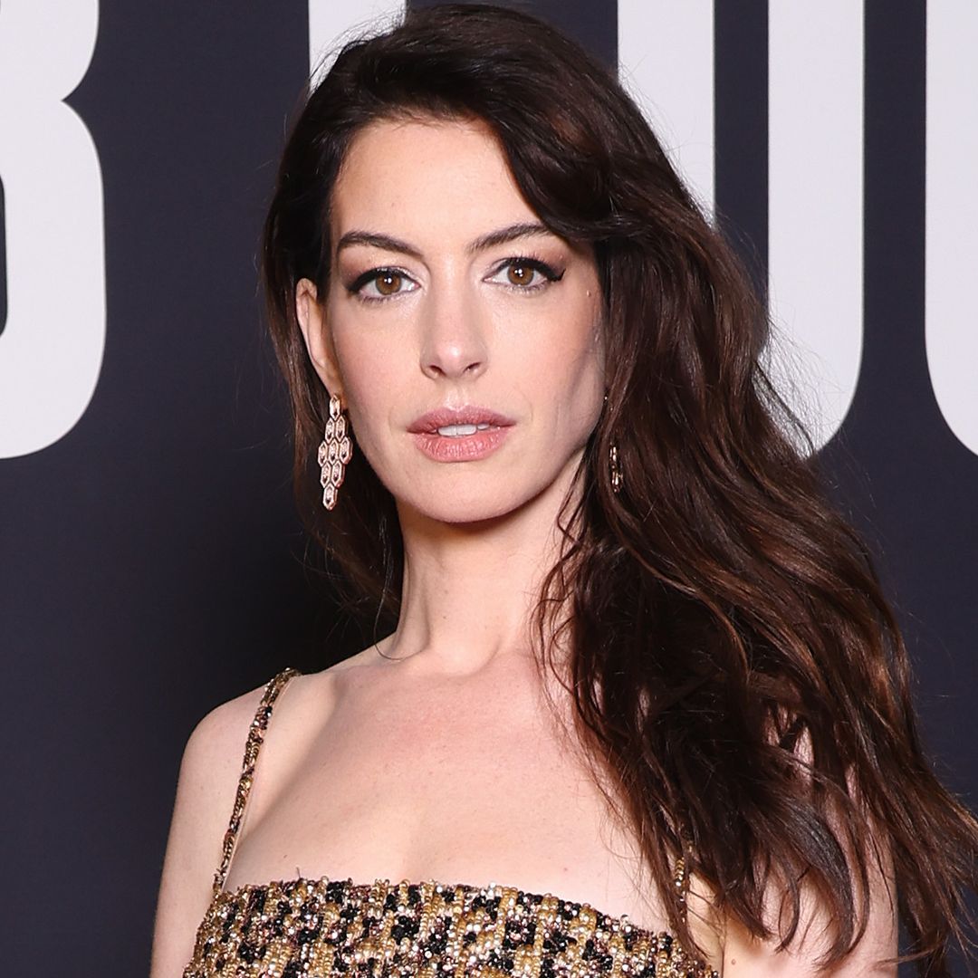 Anne Hathaway is a vision in jaw-dropping sheer corset dress
