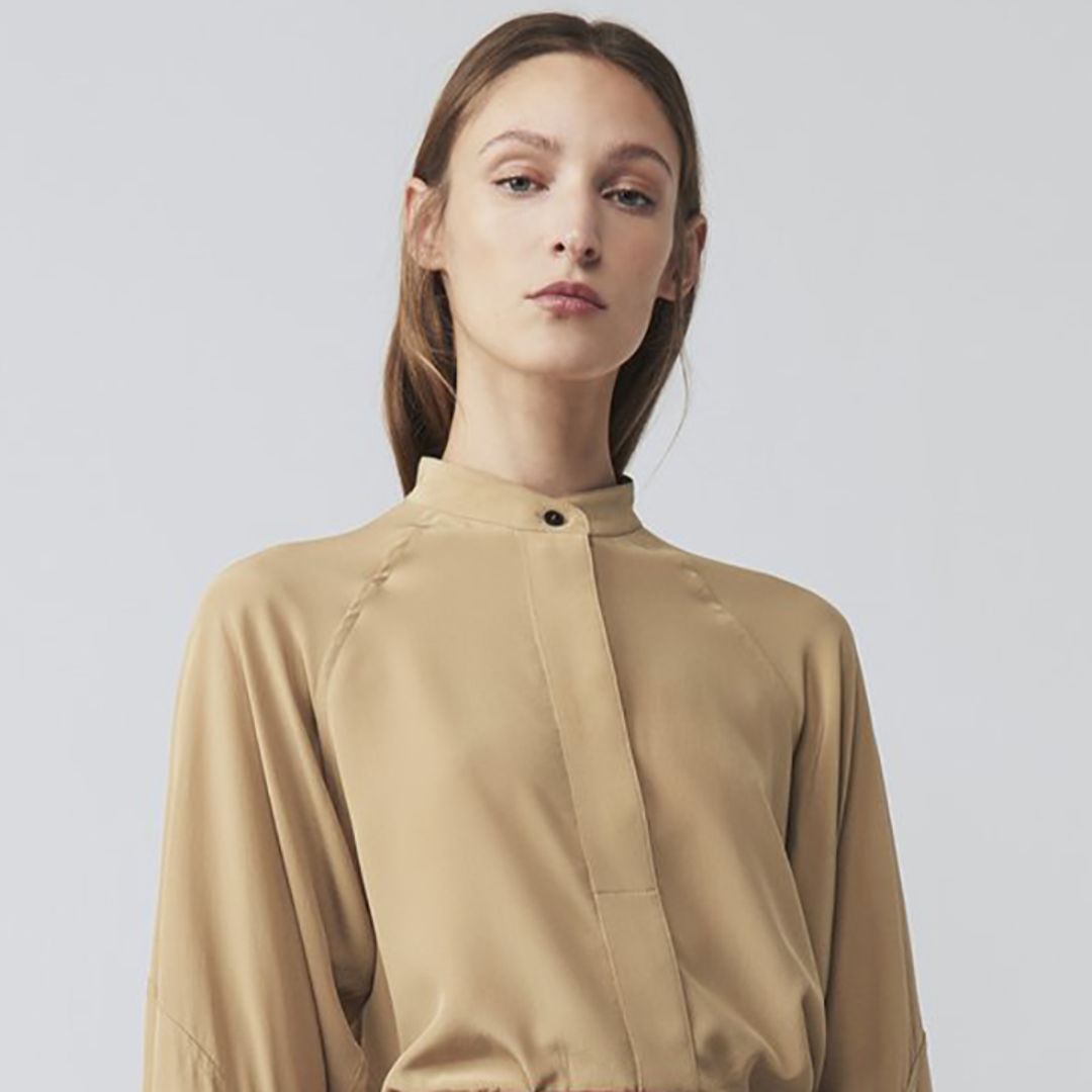 The perfect camel blouse is in the Victoria Beckham sale right now