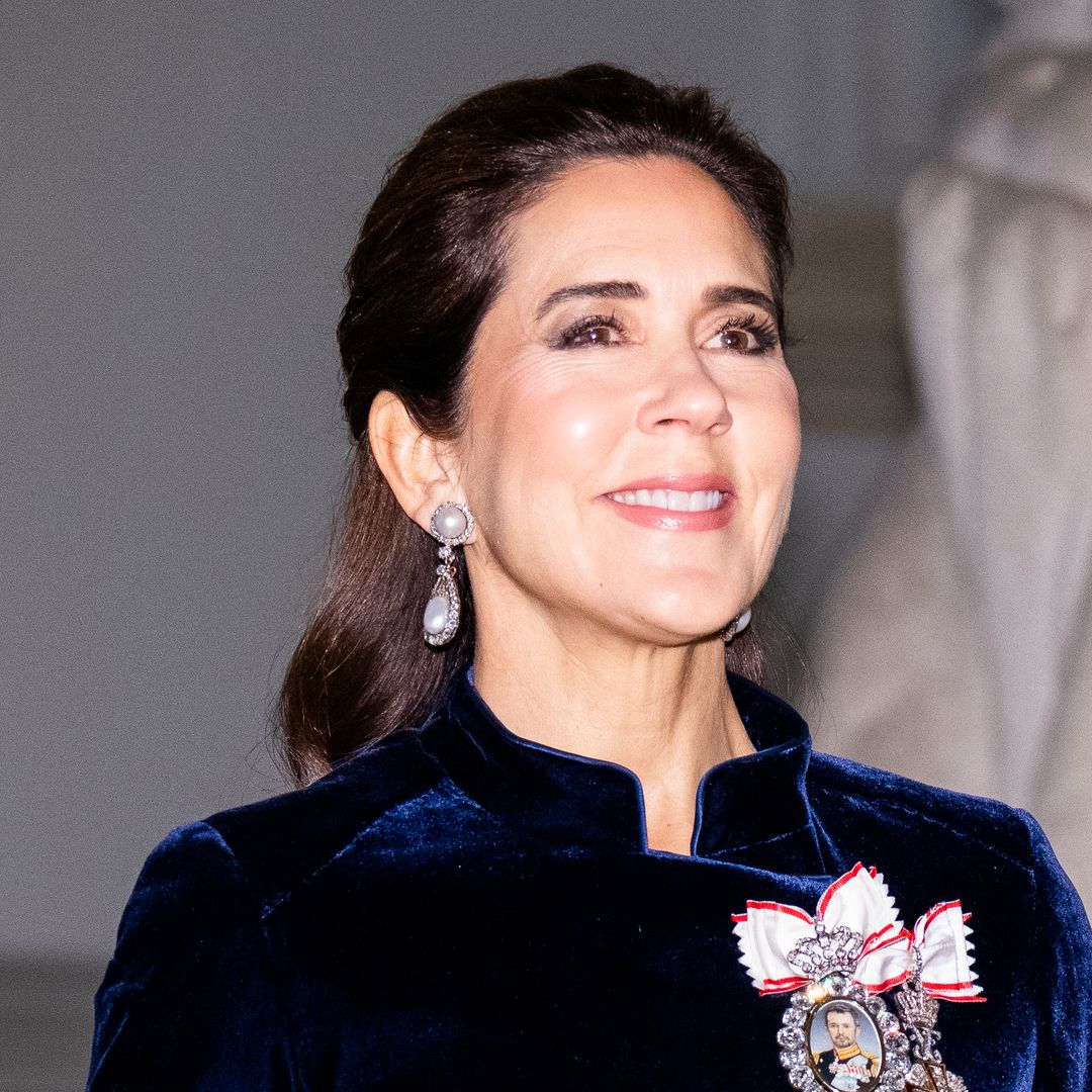 Queen Mary rings in 2026 in velvet mermaid skirt