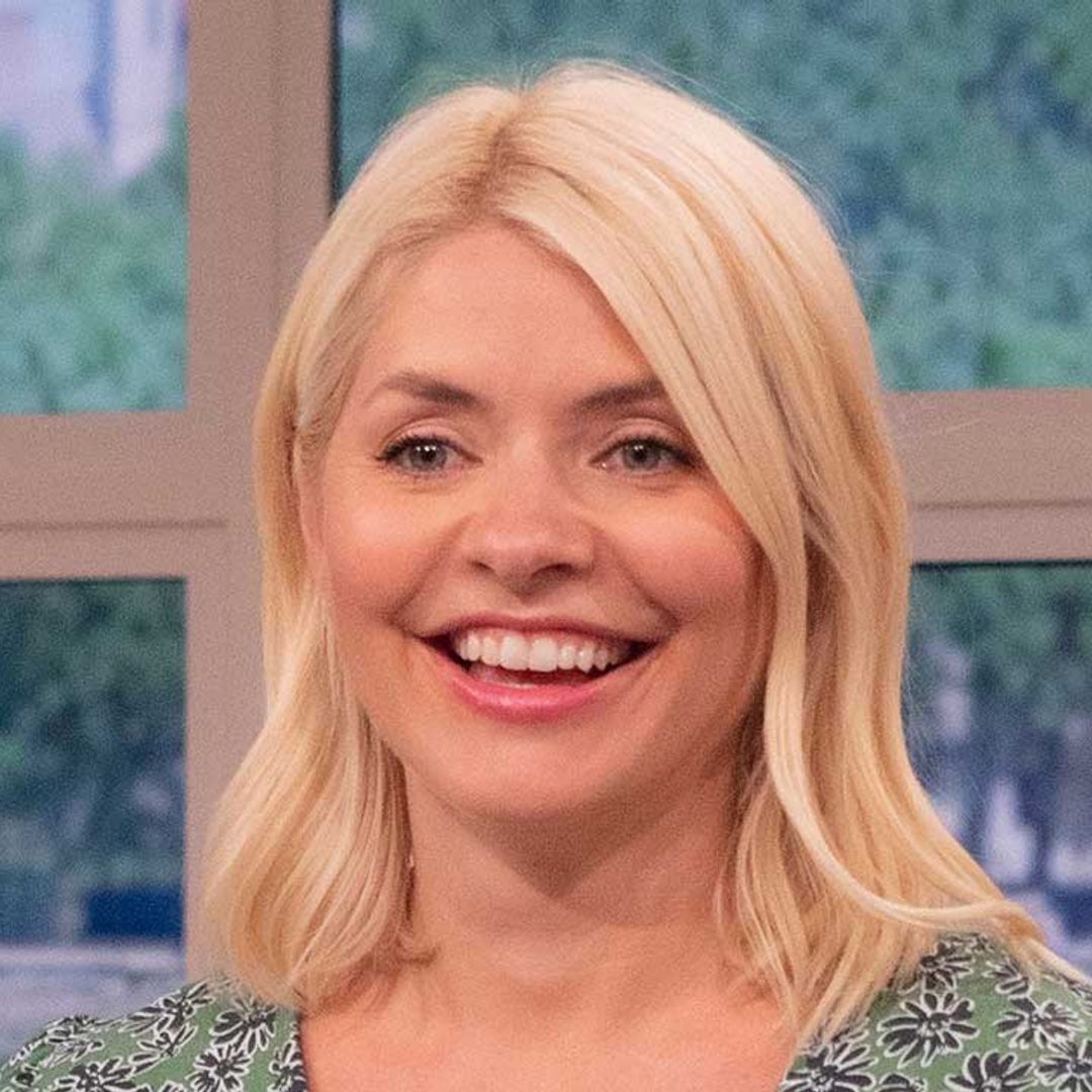 Holly Willoughby is a vision in black diamante bikini with touching twist