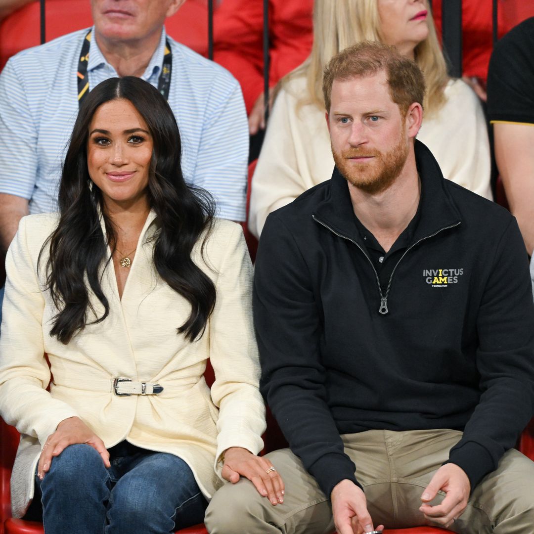 Prince Harry and Meghan Markle snuggle up in TV room at $14m mansion