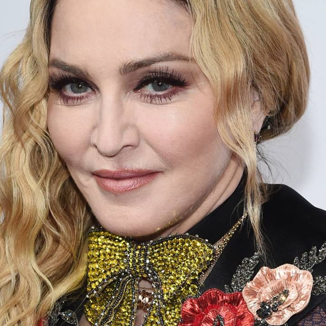 Madonna's son models dress and sunglasses in must-see video