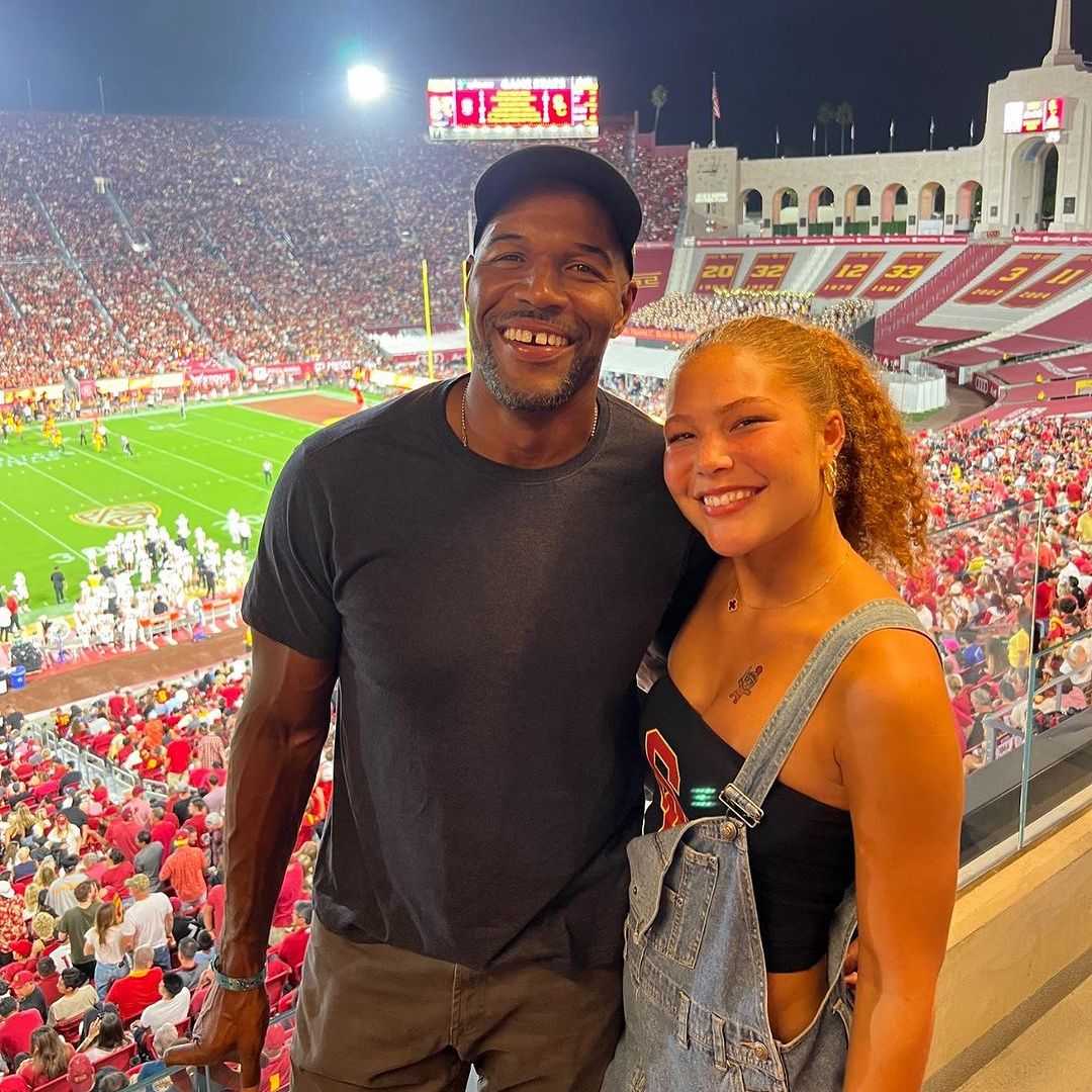 Michael Strahan's model daughter, 18, stuns in tiny red mini dress with rarely seen mom