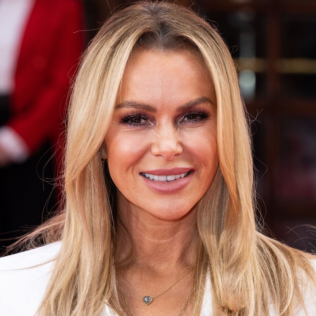 Amanda Holden stuns in red hot look with surprising accessory