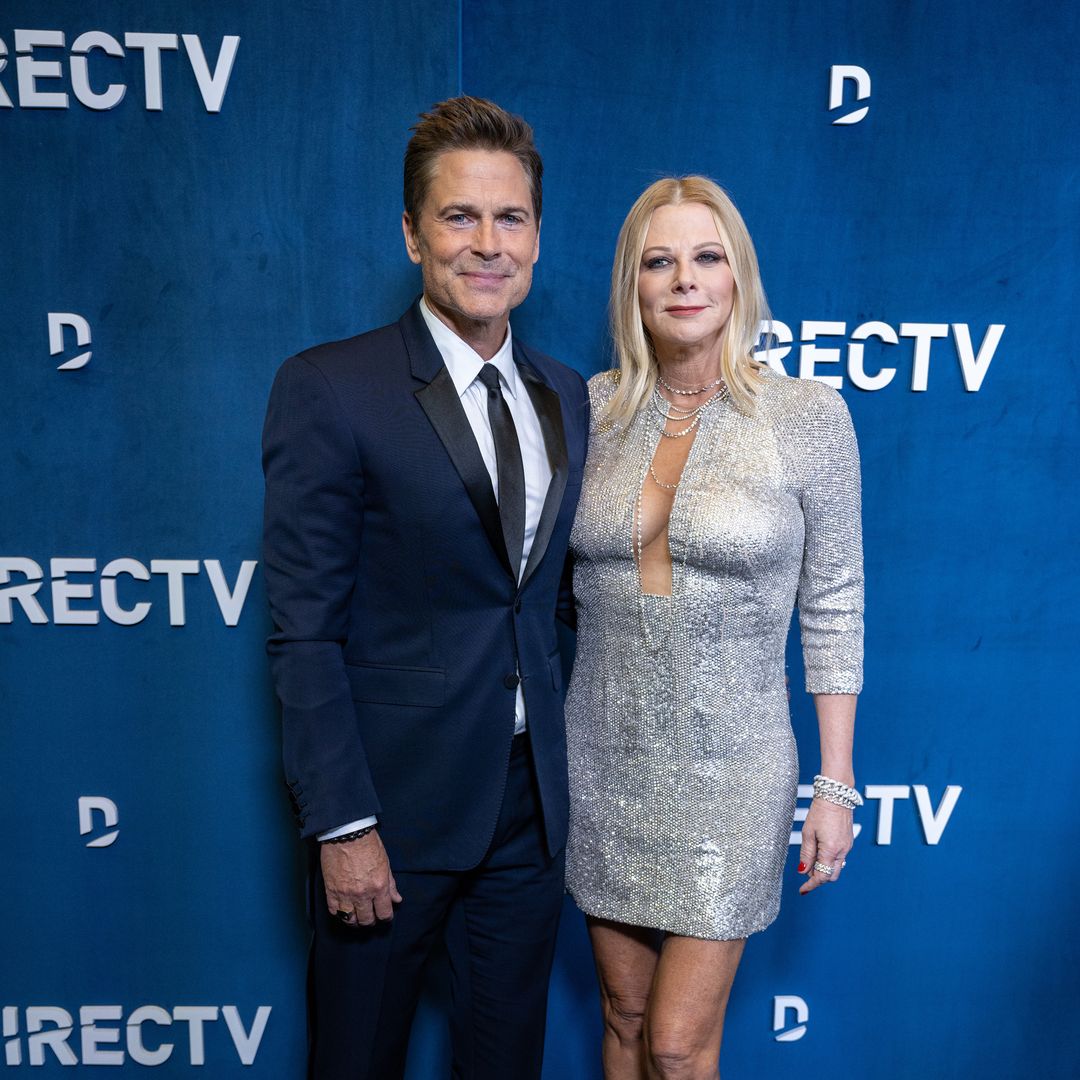 Rob Lowe, 59, looks smitten as he joins wife Sheryl Berkoff, 62, on the red carpet