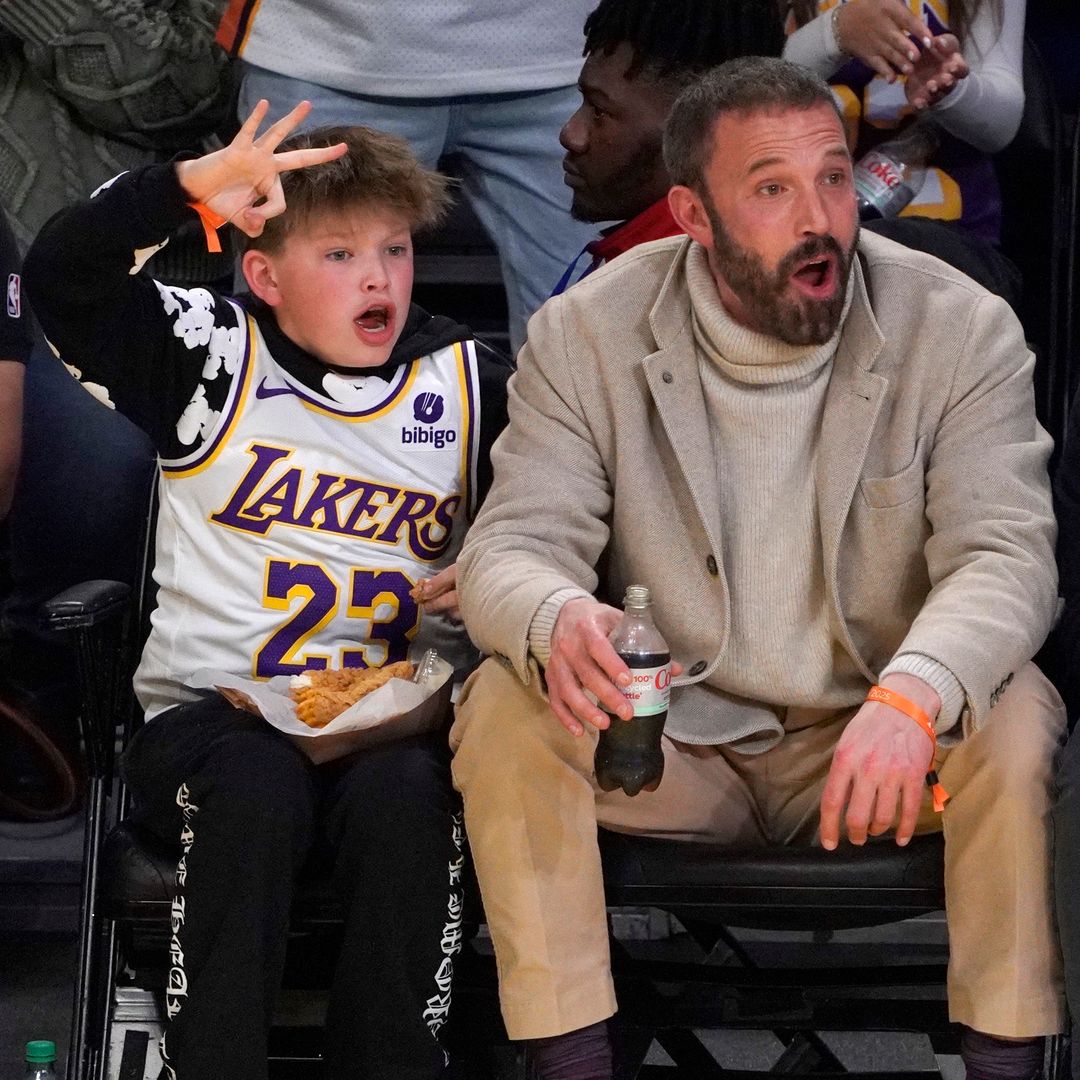 Ben Affleck (R) and Samuel Garner Affleck attend a basketball game between the Los Angeles Lakers and the Golden State Warriors at Crypto.com Arena on February 06, 2025 in Los Angeles, California.
