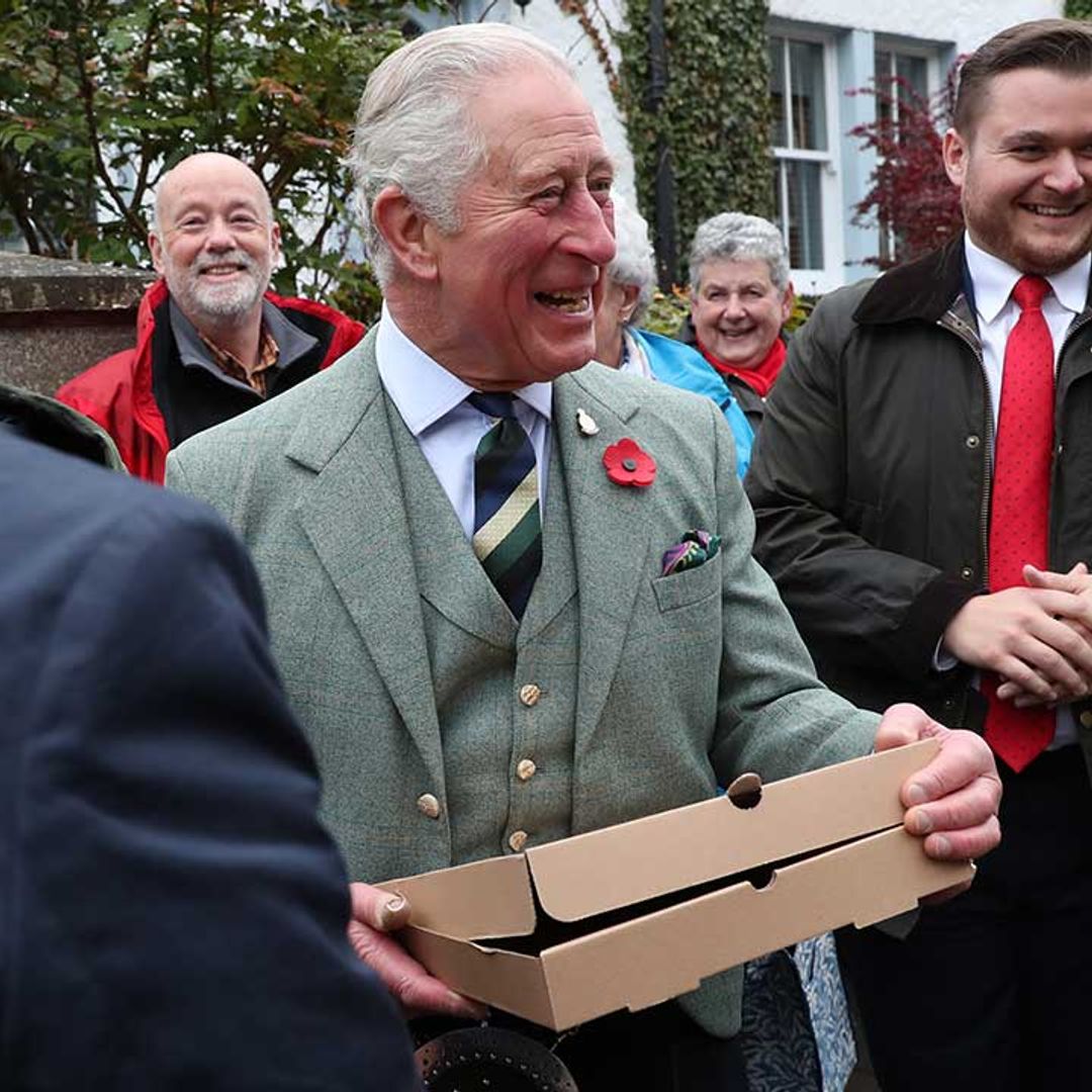 Prince Charles reveals his favourite pizza topping as he's presented with takeaway box in Scotland